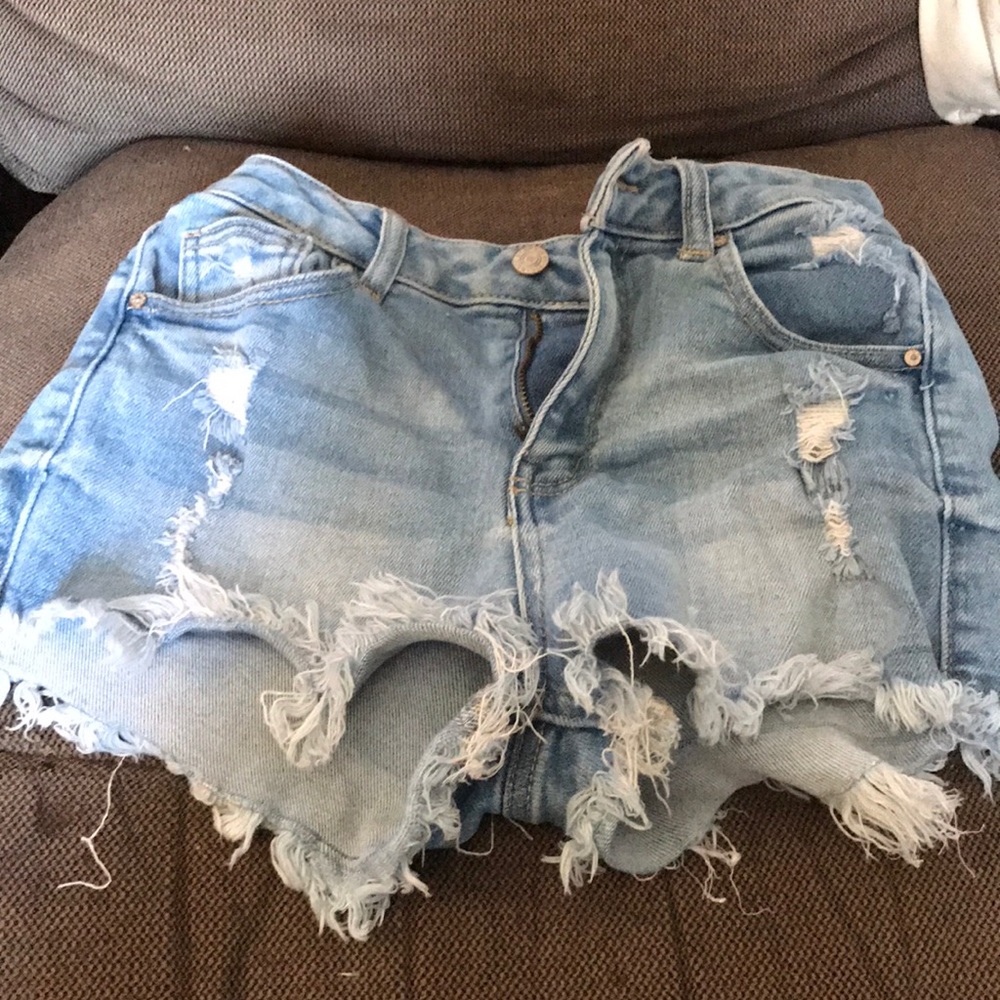 light blue denim distressed and frayed shorts
